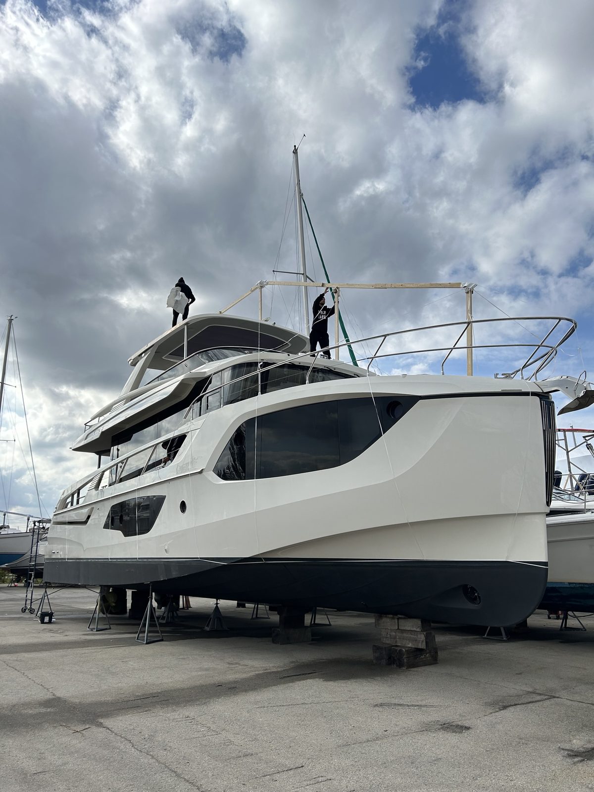 Motor yacht hauled out and prepped for shrink wrapping