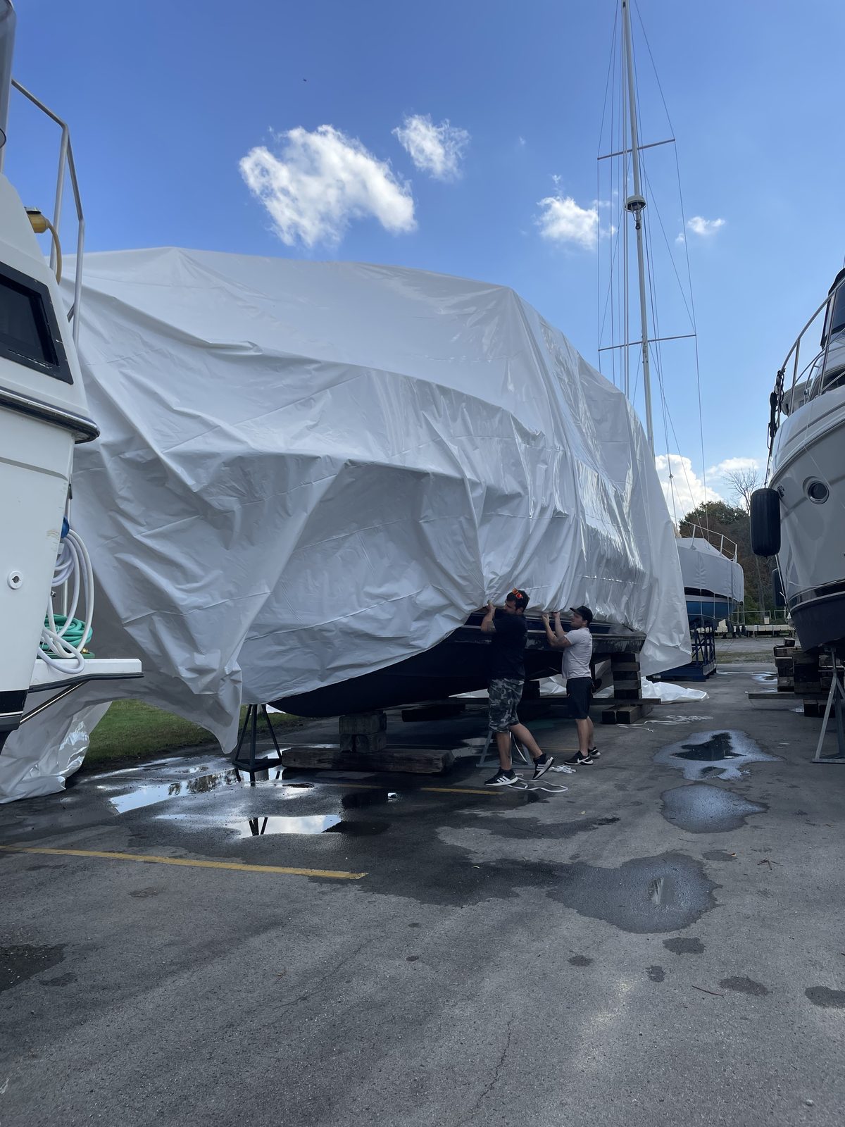 Shrink wrap film pulled over a hull before heat sealing