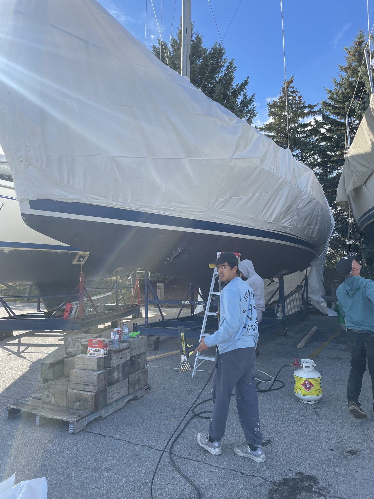 Sailboat covered and framed for winter storage